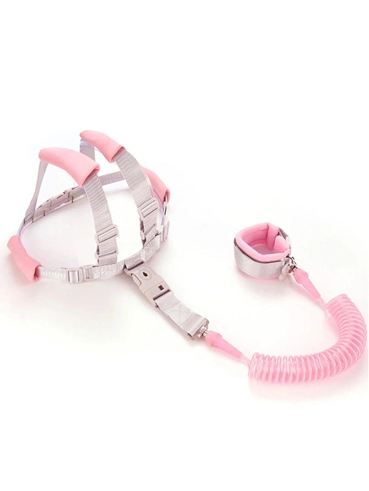 Pink child safety harness with coiled leash shown flat on a pink background
